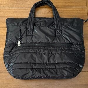 Sleek Black Quilted Tote with Zipper